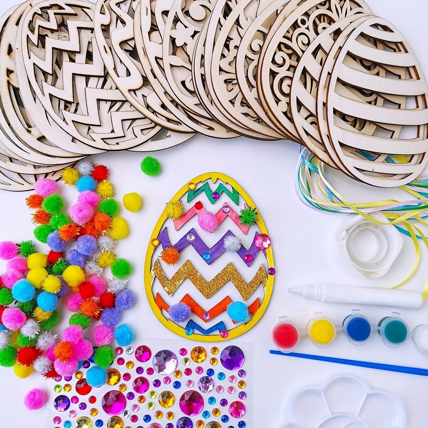 24 piece DIY wooden egg craft kit featuring unpainted hanging ornaments with etched floral patterns — view 4