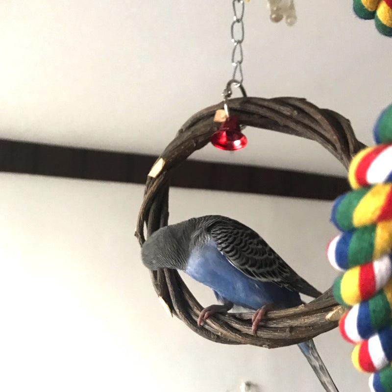 Natural apple branch bird chewing toy rattan braided ring attached to a bird cage wire — view 4