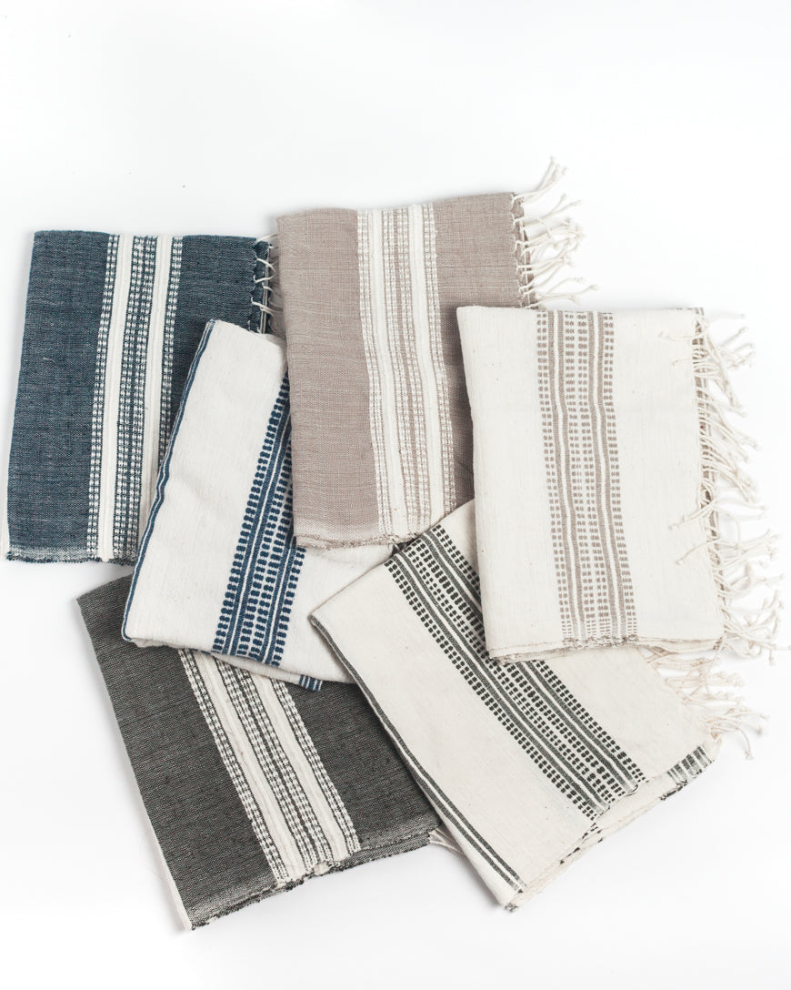 Aden cotton hand towel in a folded stack, showcasing rich hand-spun Ethiopian cotton texture — view 3