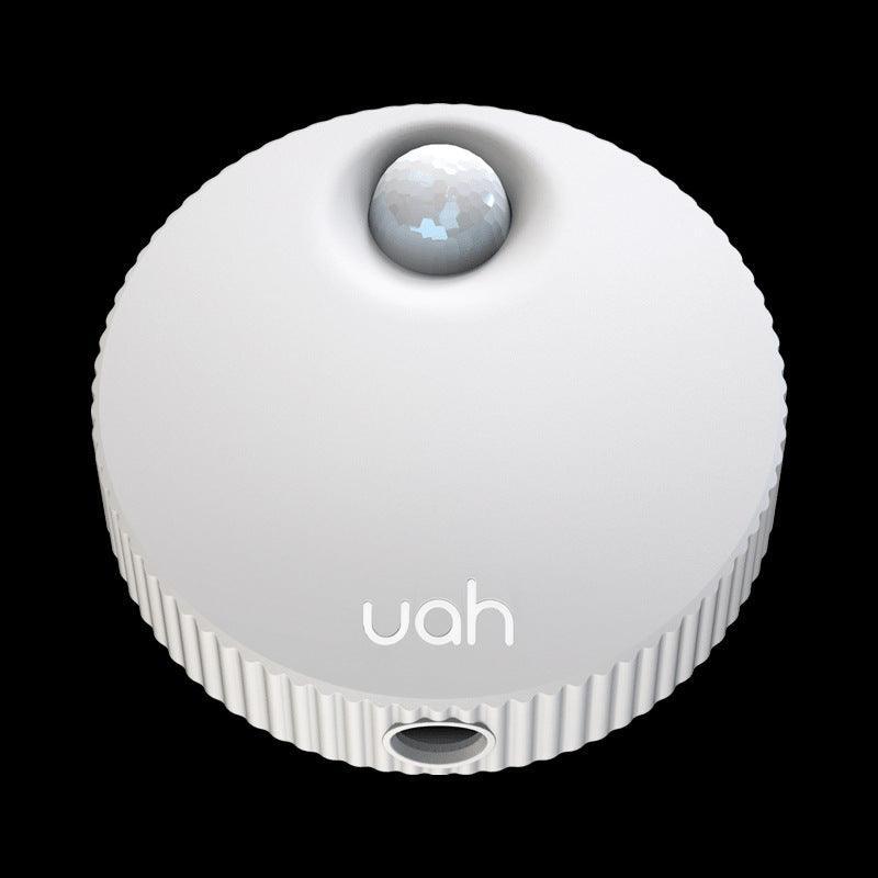 Advanced pet odor eliminator, compact white plastic USB rechargeable deodorizer for cat litter boxes.