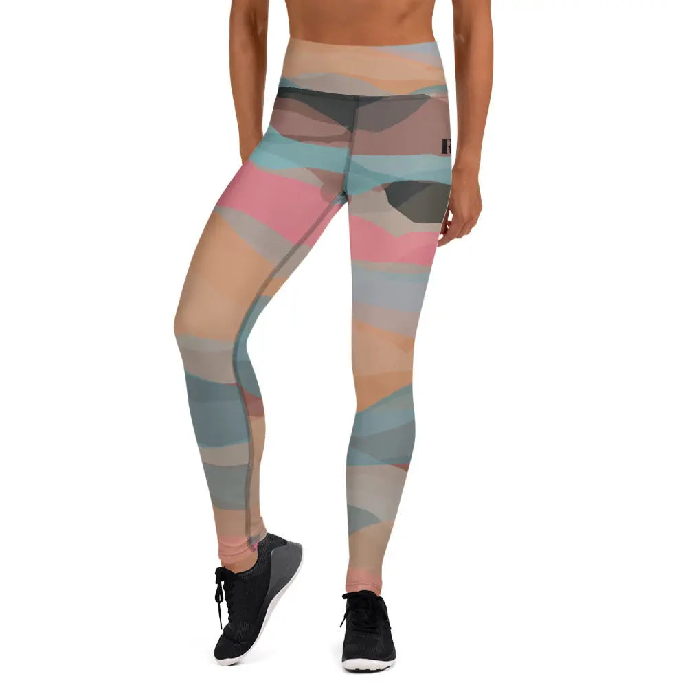 Women's high-waisted yoga leggings in solid color with four-way stretch fabric and raised waistband.