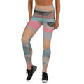 Women's high-waisted yoga leggings in solid color with four-way stretch fabric and raised waistband.