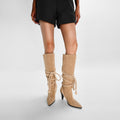 Apricot bohemian knee high boots in soft suede featuring lace-up rope ties and pointed toes