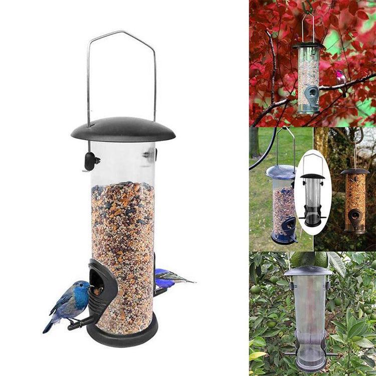 Black metal and transparent plastic automatic hanging bird feeder for outdoor garden spaces.