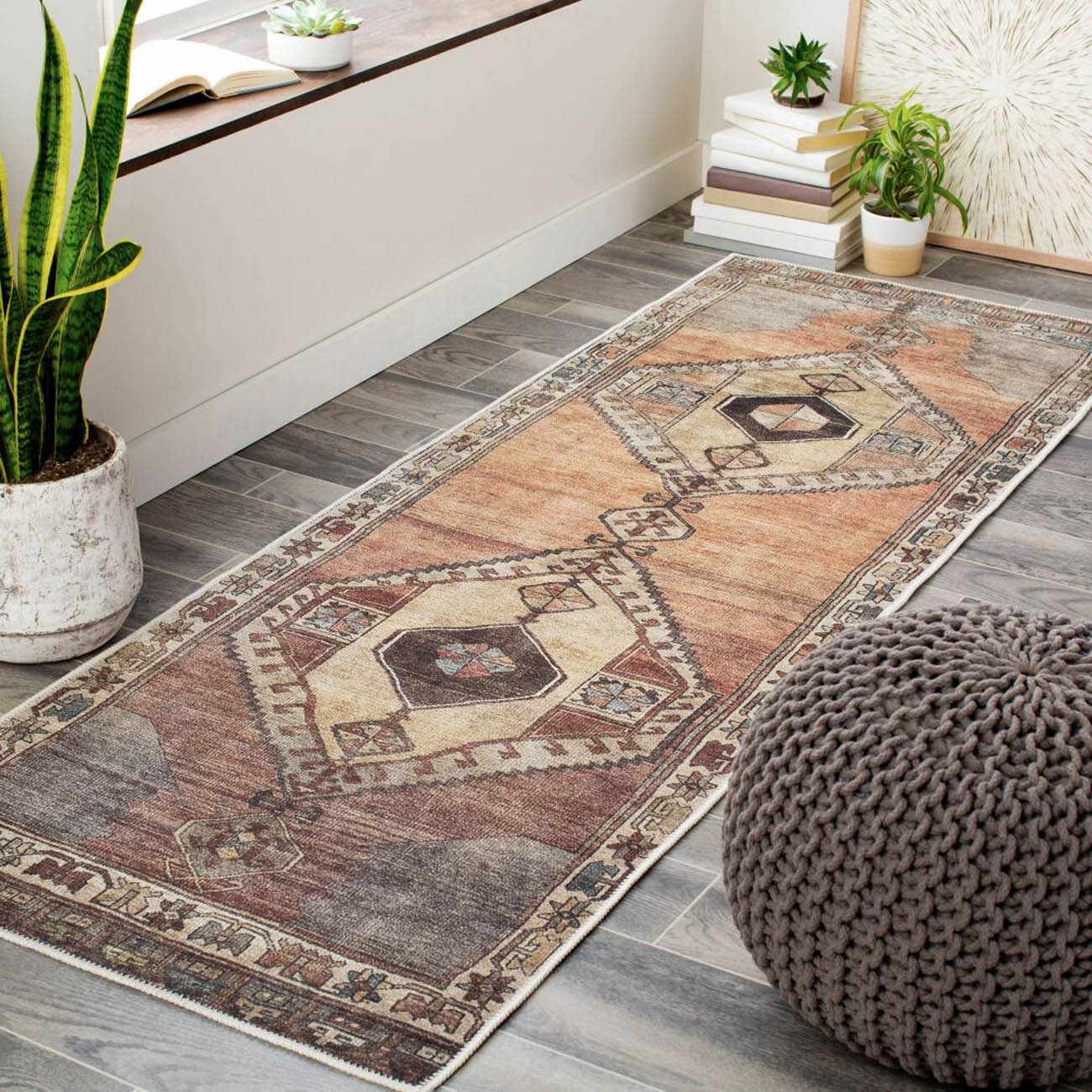 Washable runner rug in dark red traditional pattern, low pile chenille polyester blend for hallways.