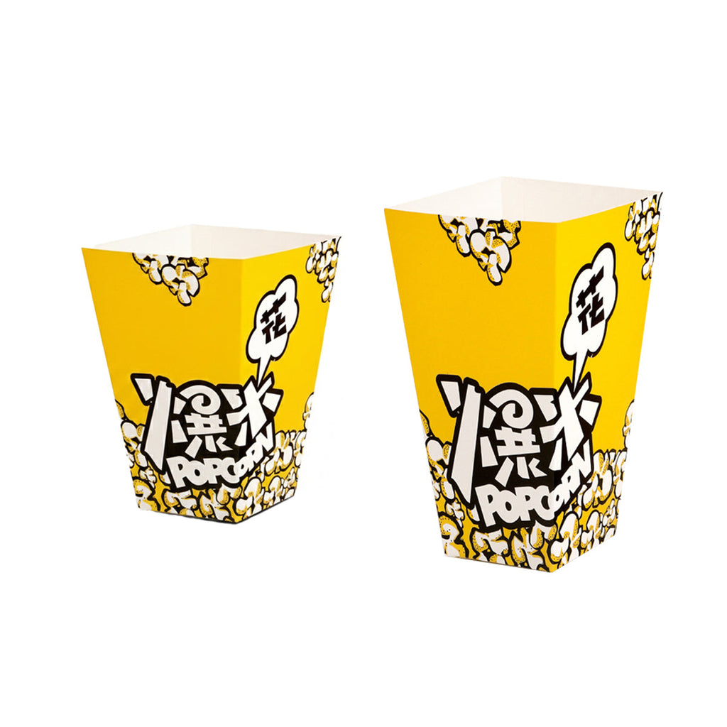 Vibrant yellow party popcorn boxes with black and white cartoon graphics for mess-free snacking — view 2