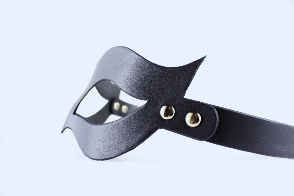 Handmade black leather fetish mask with gold-tone rivets and adjustable buckle strap for a secure fit. — view 5