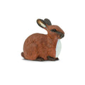 Small realistic brown rabbit toy figurine with textured fur and white chest on a plain background