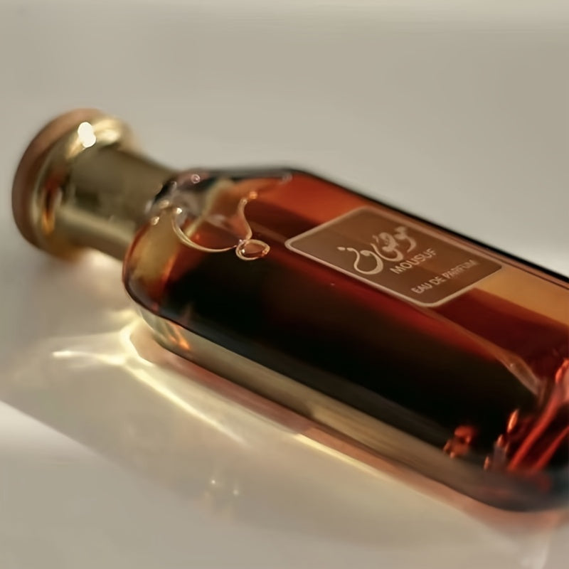 Sleek glass bottle of Arabian musk perfume with woody fragrance notes for men — view 4
