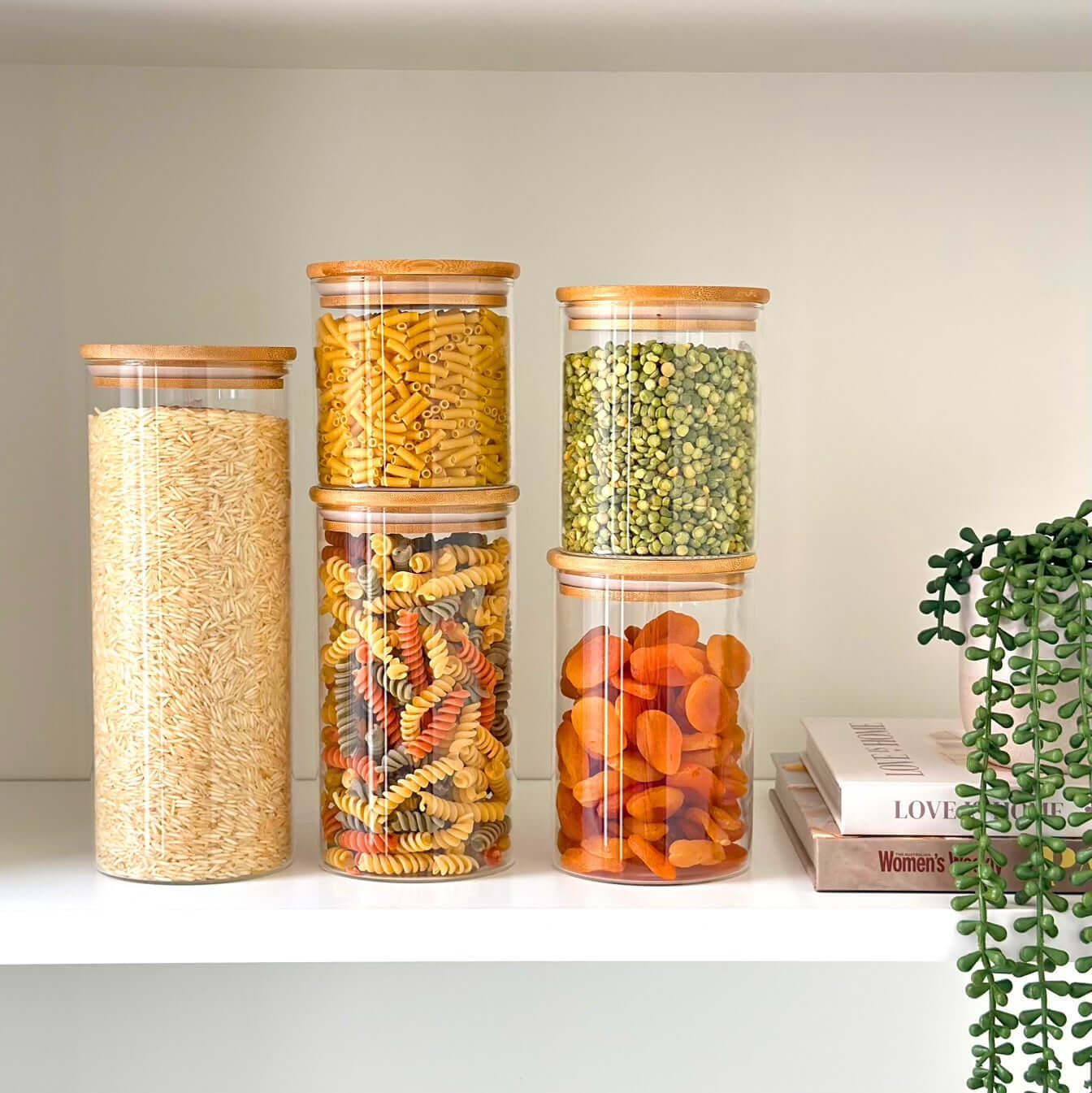 1050ml round clear glass storage jar with a natural airtight bamboo lid filled with dry ingredients — view 2
