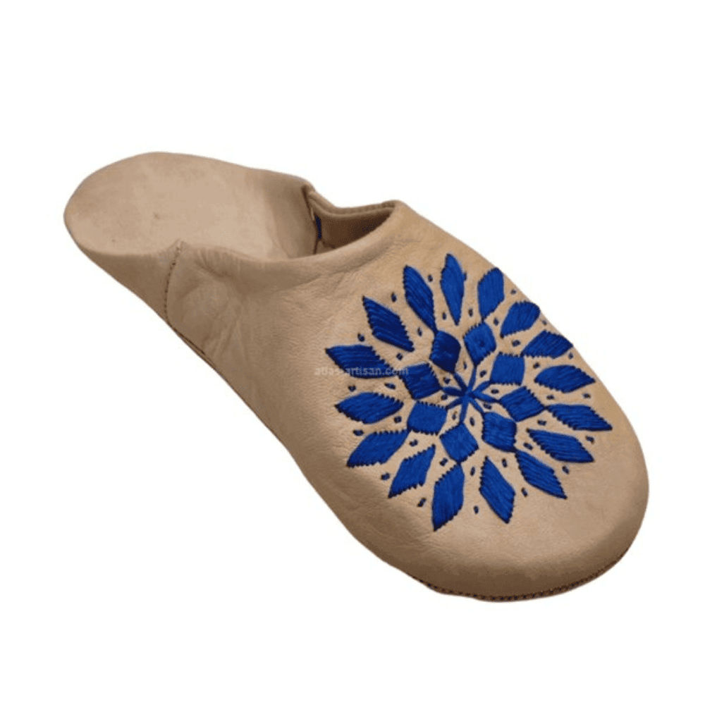 Handcrafted Moroccan leather souk slippers with decorative floral embroidery and soft flexible soles