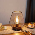 Bronze egg touch table lamp featuring metal cage design, warm LED bulb, and sturdy base
