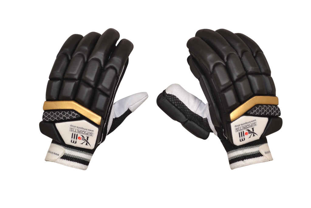 White and black premium cricket batting gloves with leather palm and ventilation panels for adult players