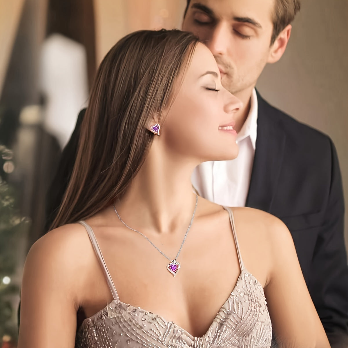 Elegant heart-shaped jewelry set featuring a necklace and earrings with purple cubic zirconia gemstones — view 3