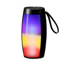 Compact black wireless Bluetooth speaker with vibrant glowing RGB LED lights and 360-degree audio output