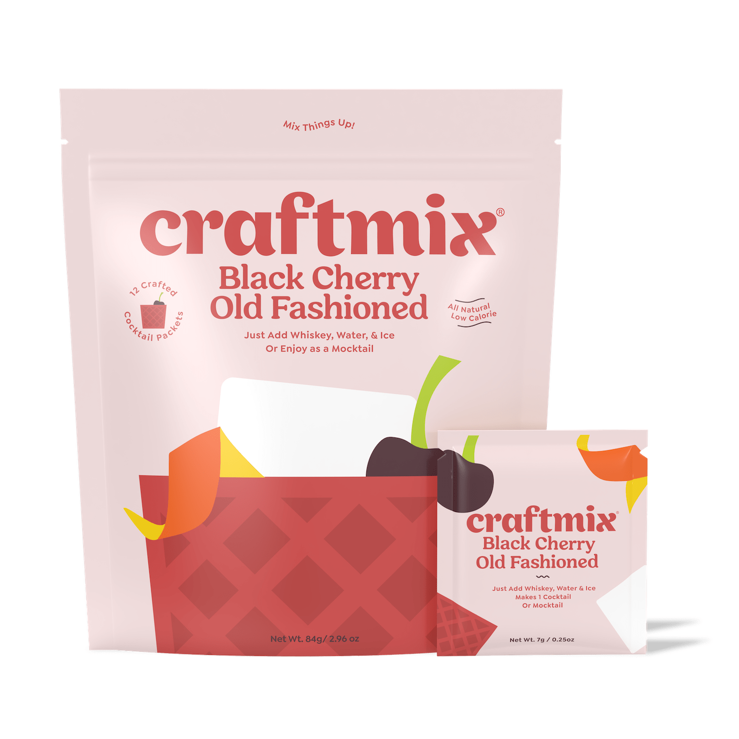 Black Cherry Old Fashioned cocktail mix packets next to a freshly prepared drink over ice
