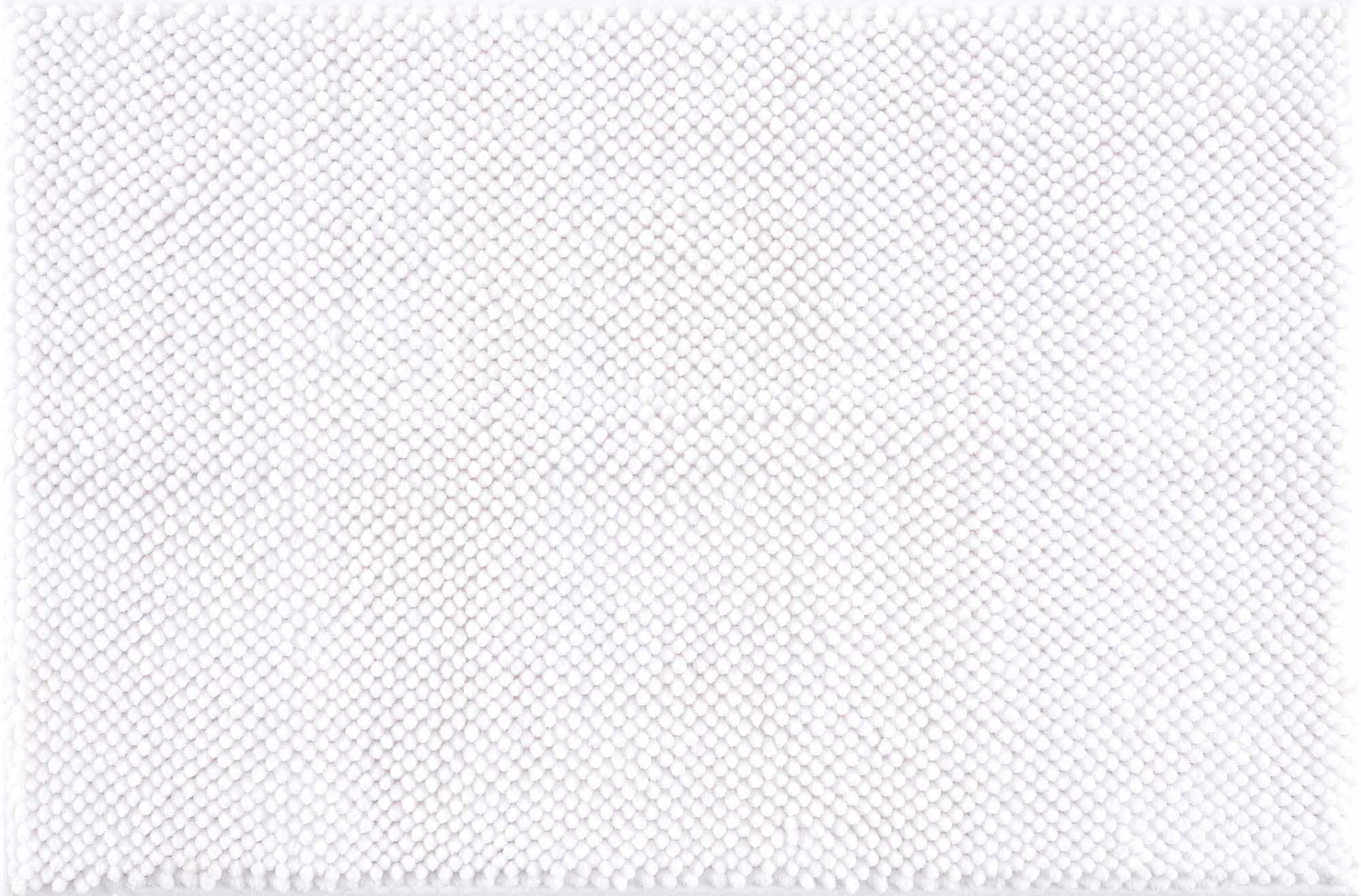Plush solid white washable bath mat made of thick absorbent polyester for bathroom floors — view 2