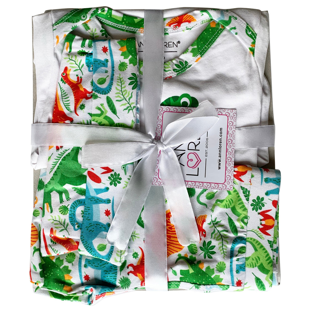 Baby boy 3-piece dinosaur layette set with bodysuit, green patterned joggers, and matching head cap — view 3