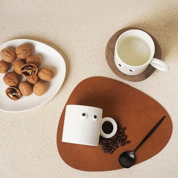 Handmade ceramic coffee mug featuring a funny big eyes cartoon design and a sturdy handle — view 4