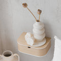 Handcrafted minimalist floating wooden nightstand with a white solid acrylic stone top and hidden drawer