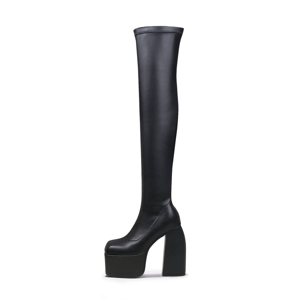 Black cyberpunk knee-high boots featuring stretchable leather, a slip-on fit, and sturdy block heels