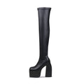 Black cyberpunk knee-high boots featuring stretchable leather, a slip-on fit, and sturdy block heels