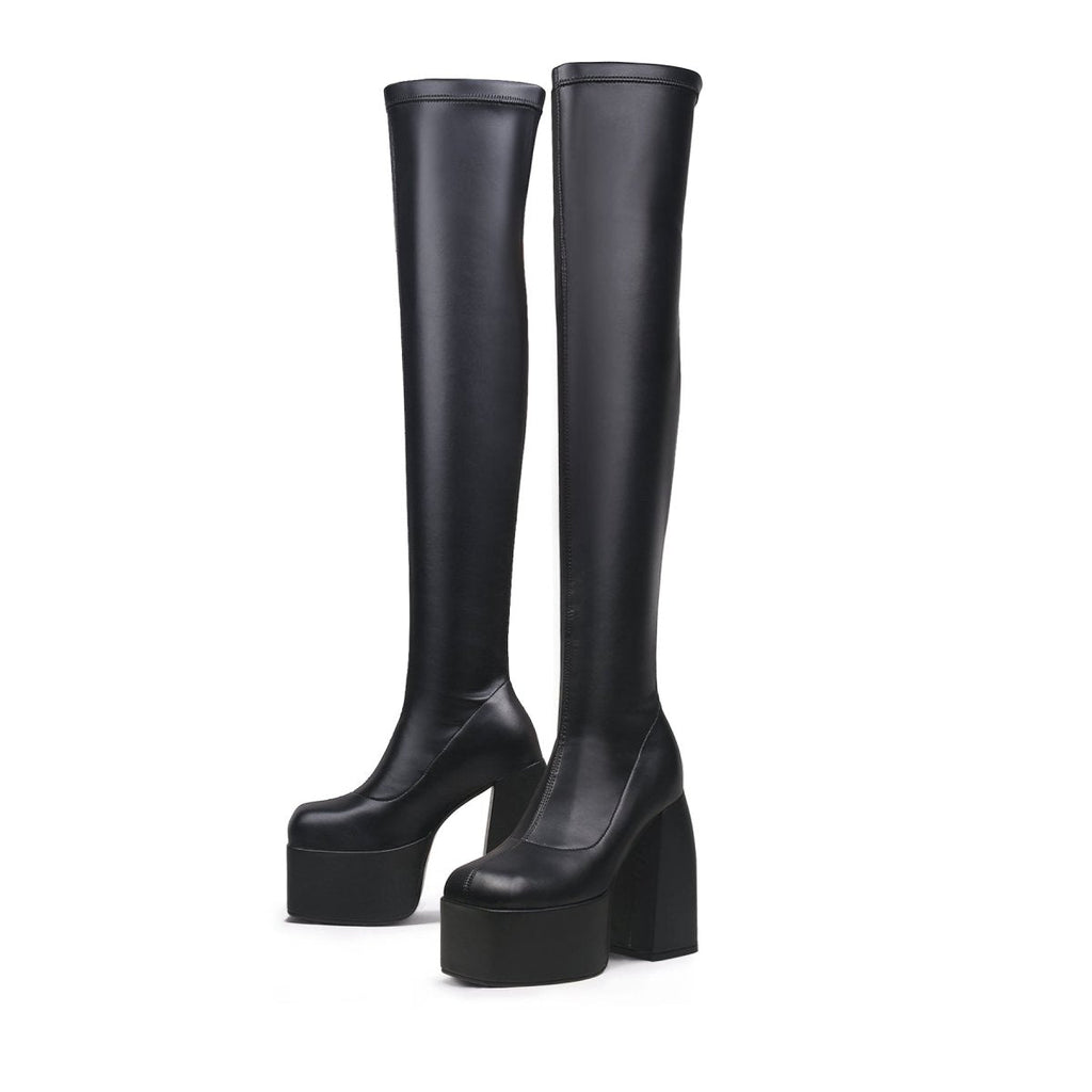 Black cyberpunk knee-high boots featuring stretchable leather, a slip-on fit, and sturdy block heels — view 5