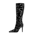 Black floral crystal embellished knee-high boots in deep velvet with a pointed toe and stiletto heel