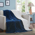 Night blue sherpa throw blanket featuring an elegant embossed floral and paisley microfleece front.