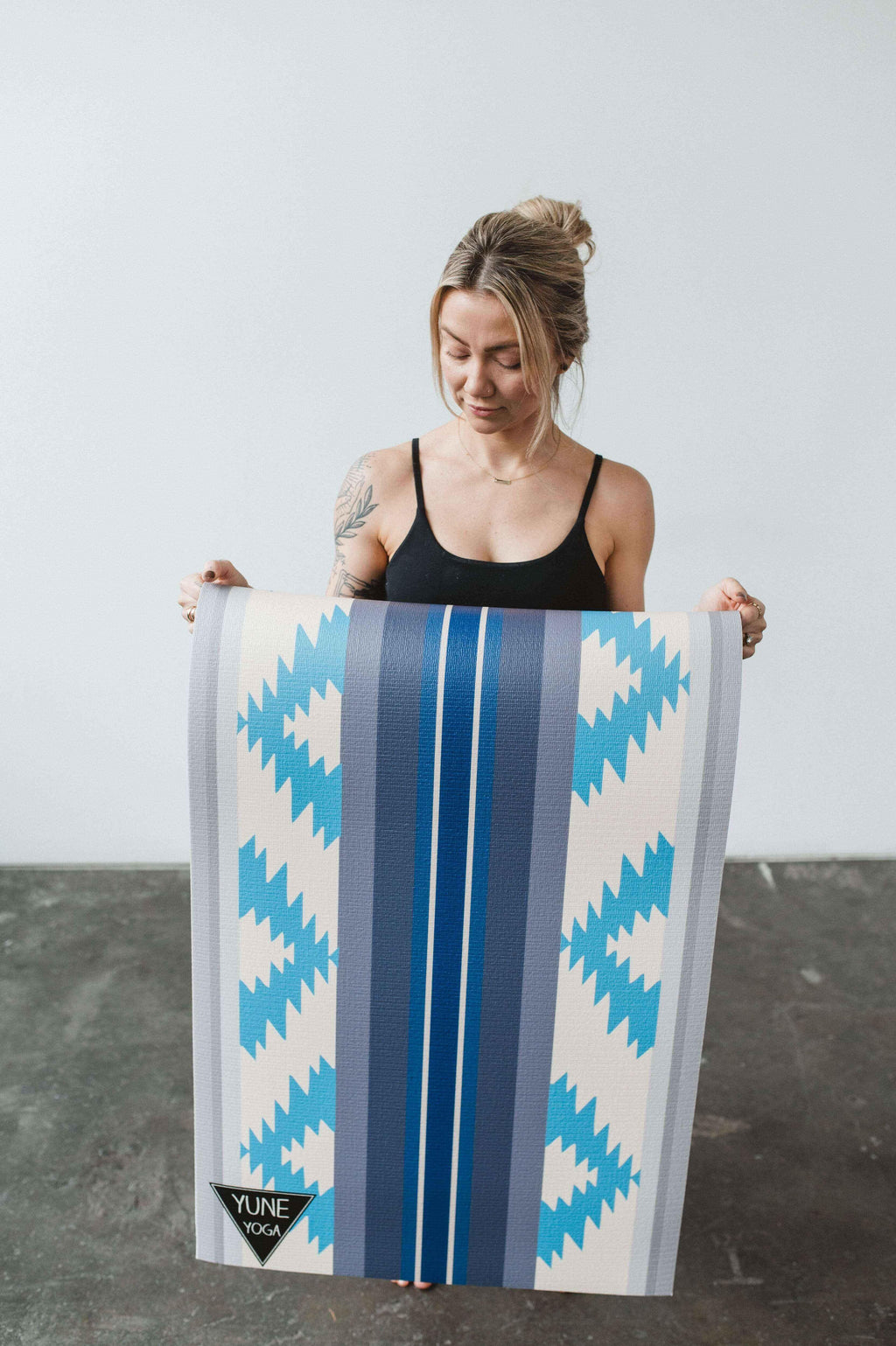 Bear Creek Juniper yoga mat in green with 6mm thickness, rolled out for exercise