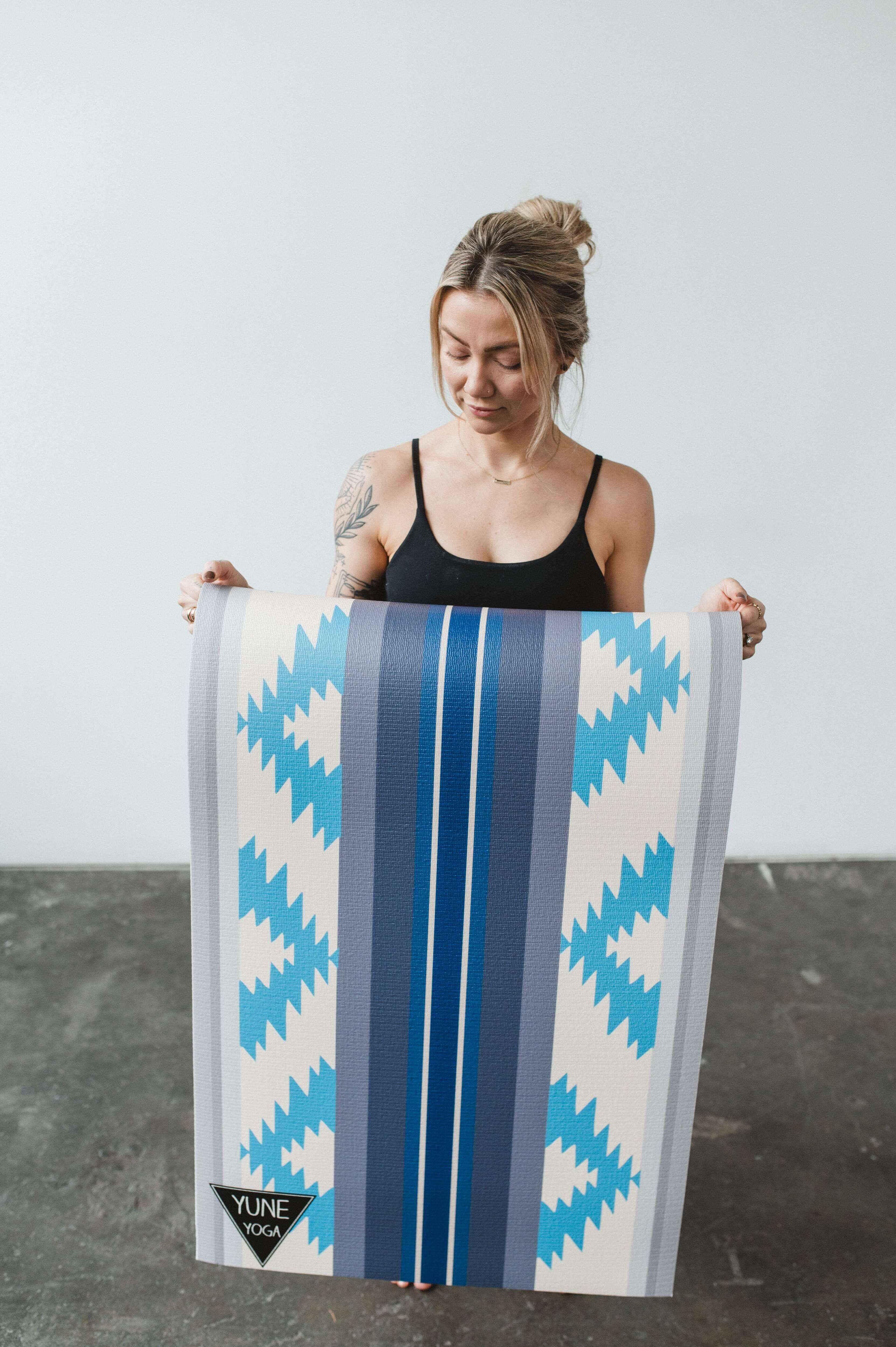 Bear Creek Juniper yoga mat in green with 6mm thickness, rolled out for exercise