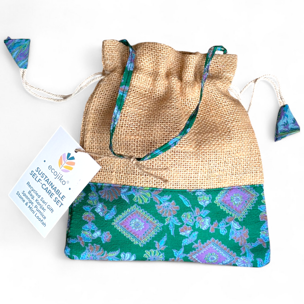 Sustainable self care beauty gift set with pumice stone, konjac sponge, loofah, and upcycled bag — view 4