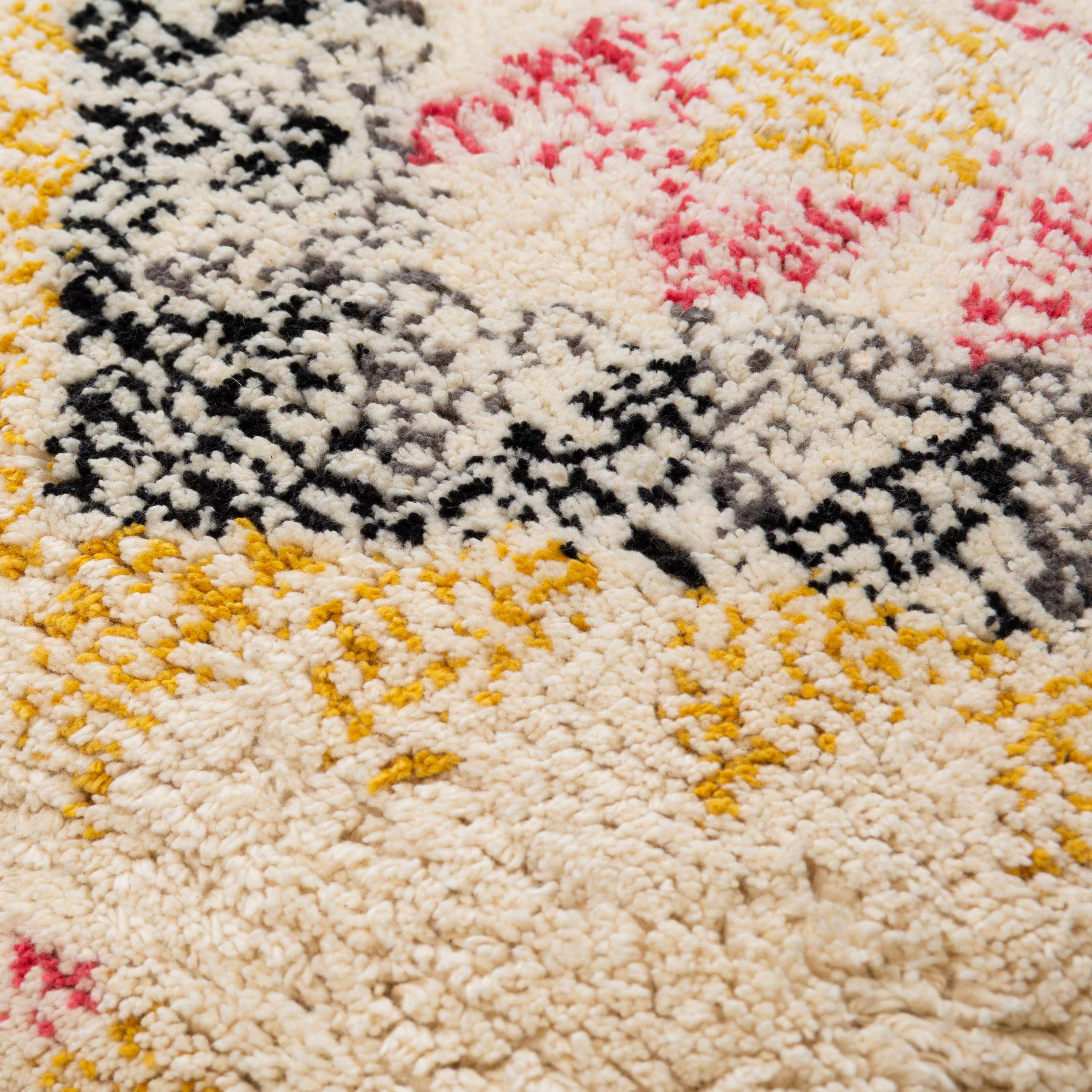 Square woven cotton throw pillow featuring vibrant black, mustard, pink, and beige bohemian color tones. — view 4