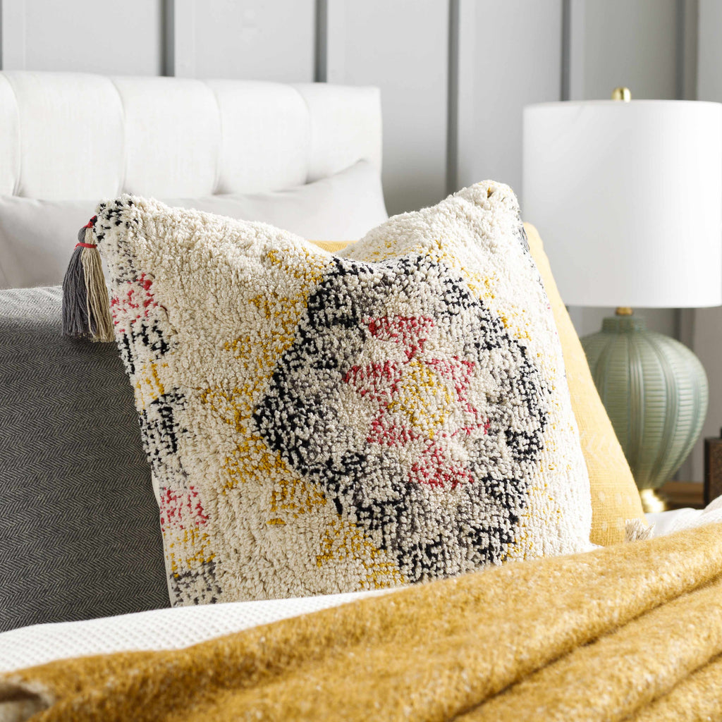 Square woven cotton throw pillow featuring vibrant black, mustard, pink, and beige bohemian color tones. — view 3