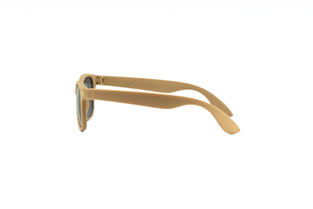 Matte beige kids wayfarer sunglasses with dark smoke lenses and metal rivet details on the temples. — view 3