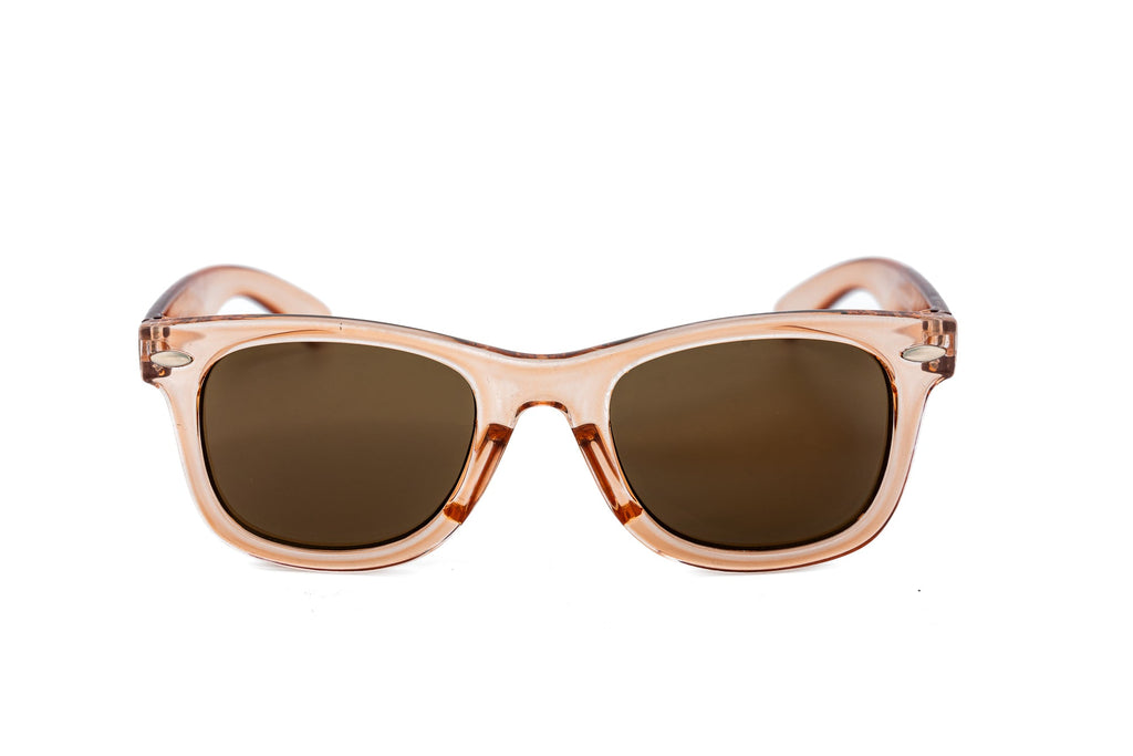 Translucent pink kids wayfarer sunglasses with brown tinted lenses and glossy acetate finish — view 2