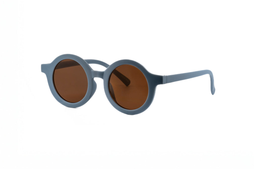 Kids round sunglasses with matte blue polycarbonate frames and amber tinted lenses for toddlers.