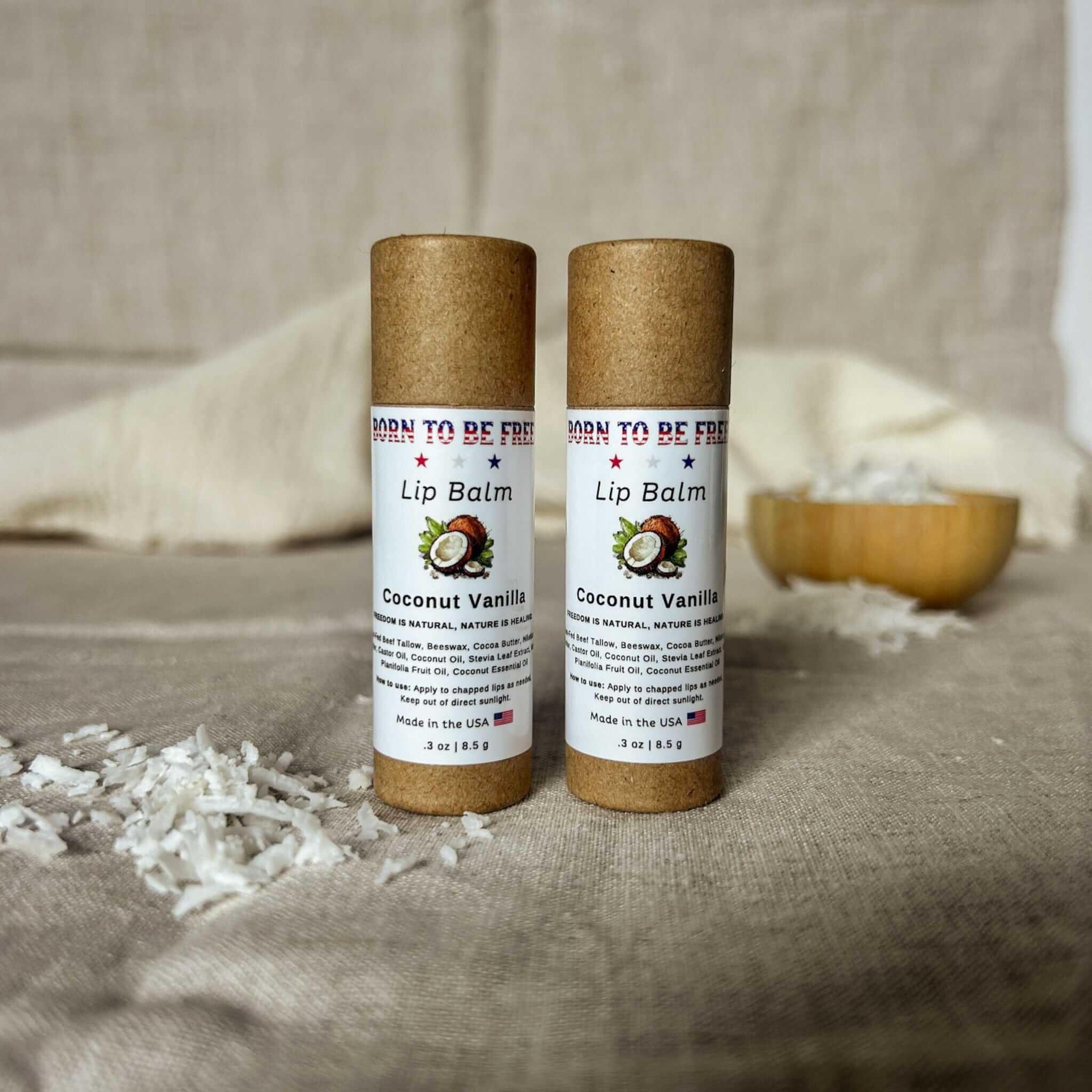 Natural coconut vanilla tallow lip balm in an eco-friendly kraft paper push-up tube packaging