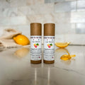 Grapefruit lemon natural lip balm in an eco-friendly kraft paper push-up tube