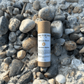 Natural sun lip balm tube in neutral tones with SPF mineral protection and tallow formulation