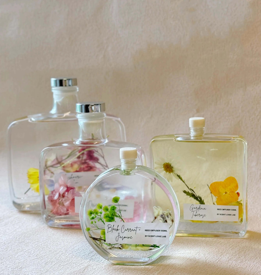 Botanical reed diffuser in elegant glass bottle featuring natural reeds and premium essential oils — view 3