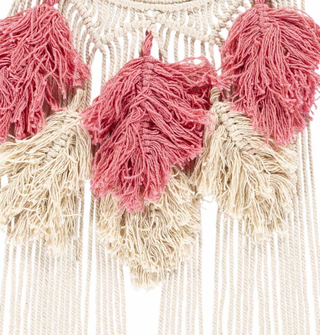 Blush pink and ivory hand woven boho cotton tassel wall hanging on a metal rod — view 3