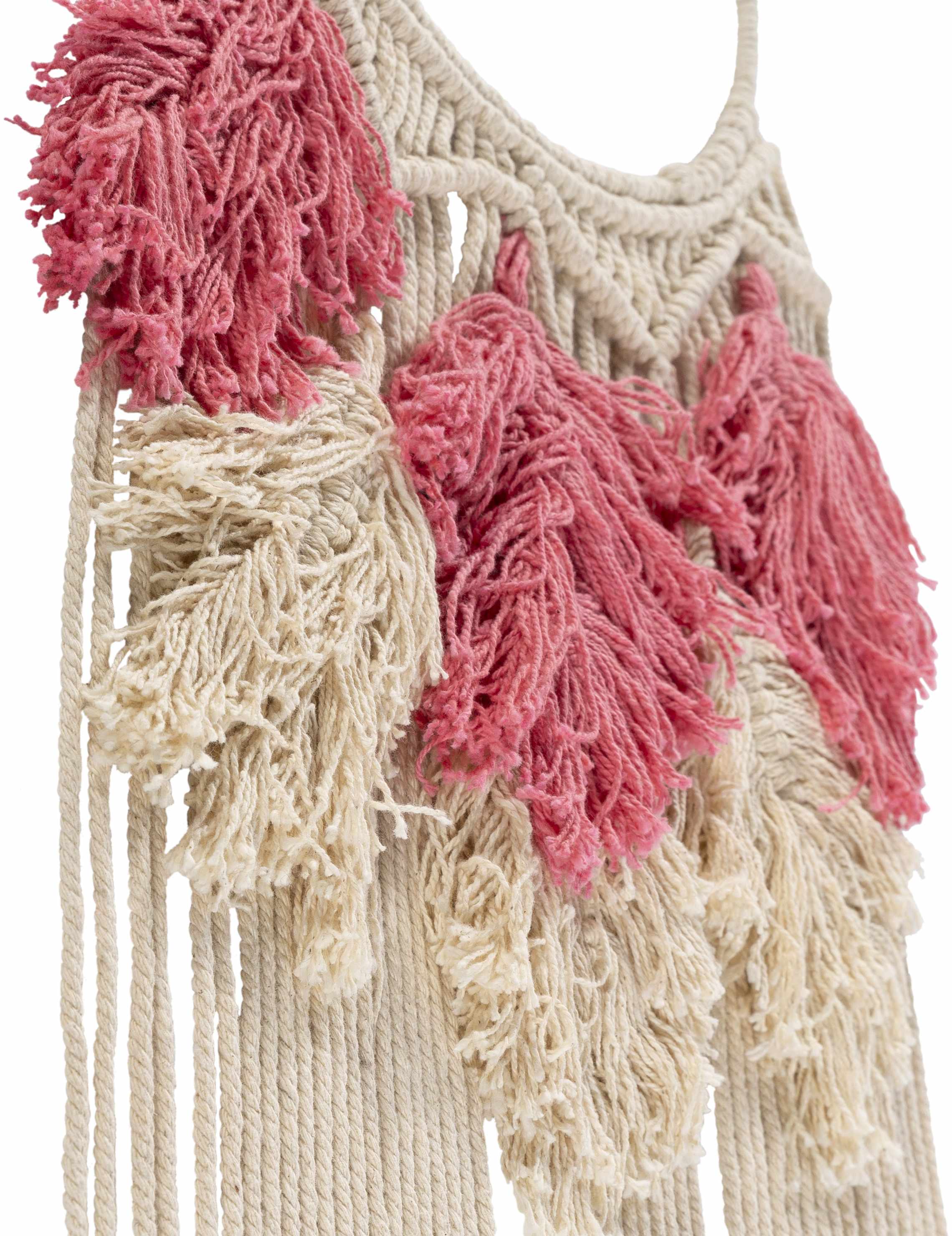Blush pink and ivory hand woven boho cotton tassel wall hanging on a metal rod — view 2