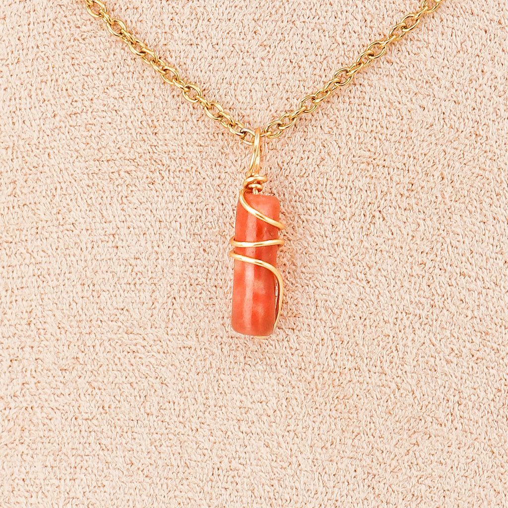 Plum blossom jade mini pillar pendant necklace displayed on a leather cord or gold chain