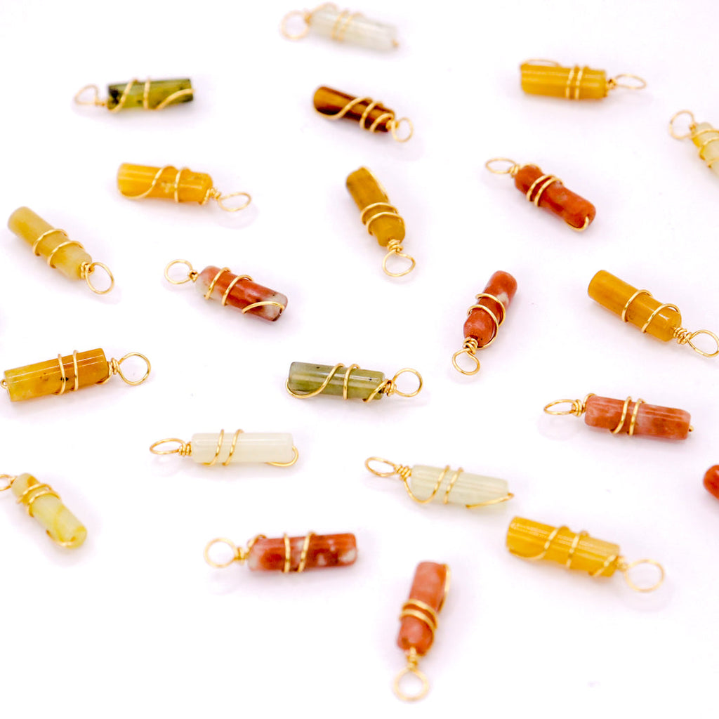 Plum blossom jade mini pillar pendant necklace displayed on a leather cord or gold chain — view 2