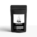 Breakfast Blend whole bean coffee in a premium bag medium roast with dark chocolate flavor notes
