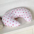 Soft pink breastfeeding nursing pillow cover featuring a delicate white star pattern and zipper