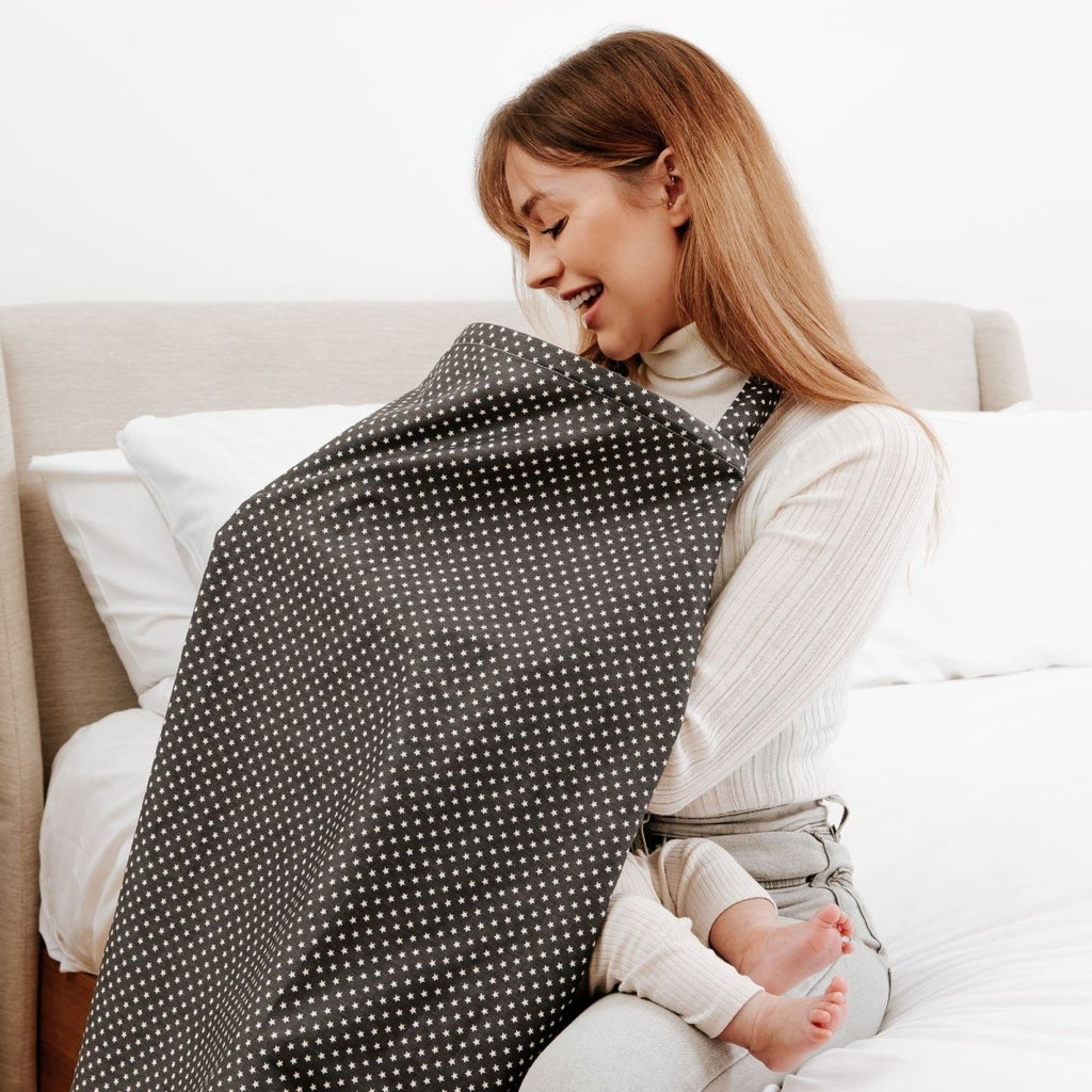 White stars breastfeeding apron made of lightweight cotton with an adjustable boned neckline