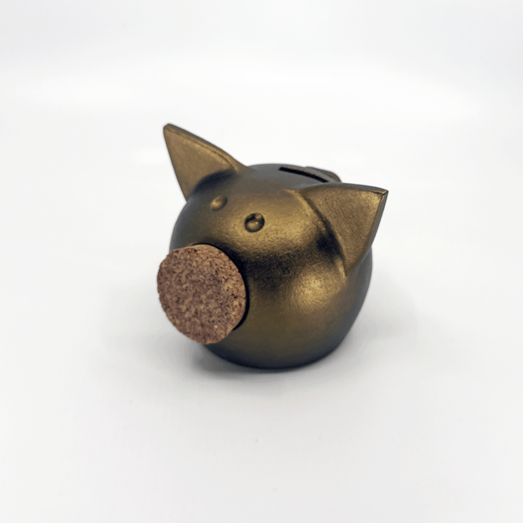 Handmade ceramic piggy bank in a metallic autumn hue with a natural cork snout