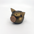 Handmade ceramic piggy bank in a metallic autumn hue with a natural cork snout